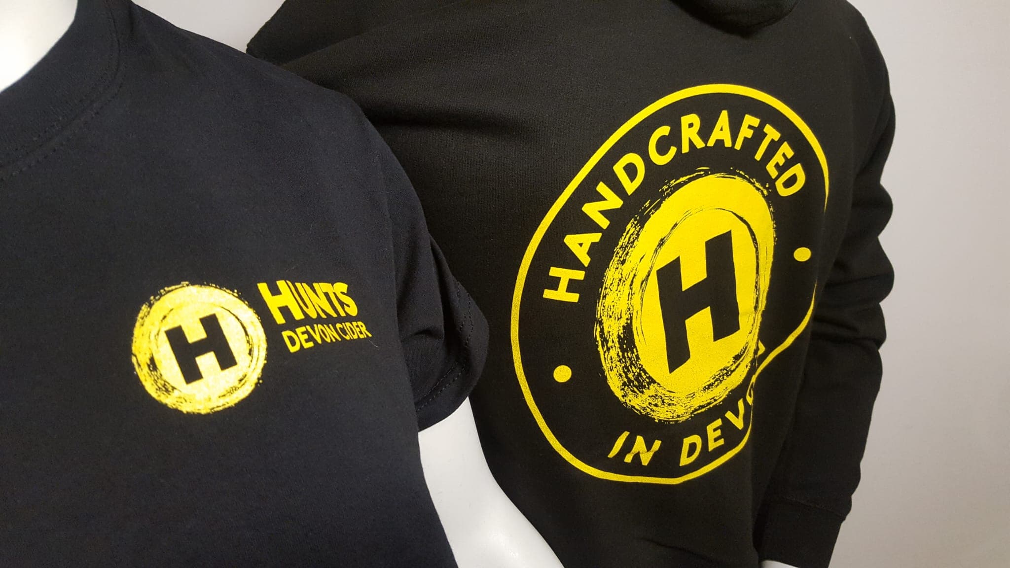 Group wearing matching custom-printed event t-shirts